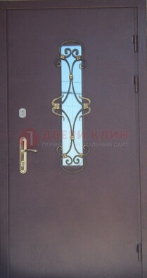 Металлическая дверь со стеклом и ковкой ДСК-77 в Чебоксарах